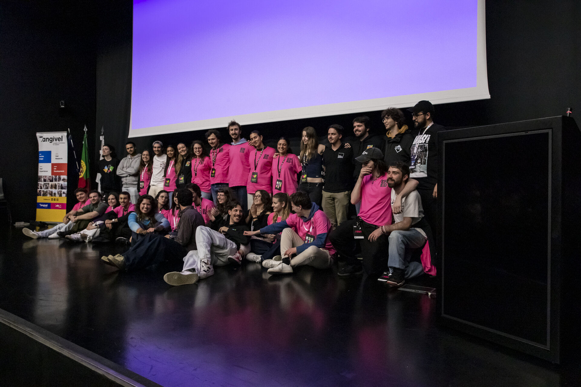 Picture of ENED's team on a stage.
