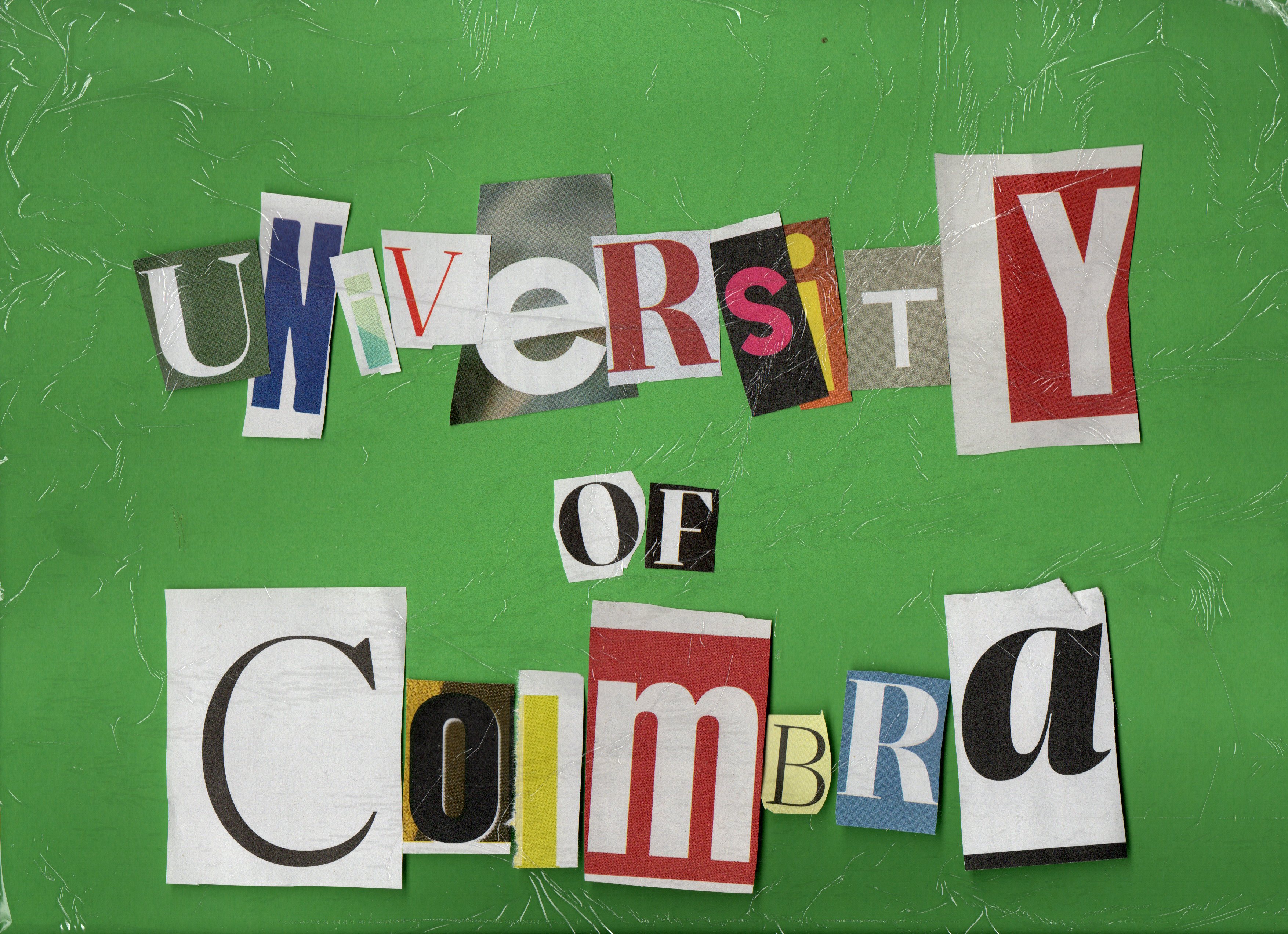 Scanned image of paper cutouts of letters, spelling "University of Coimbra", with a green chroma background.